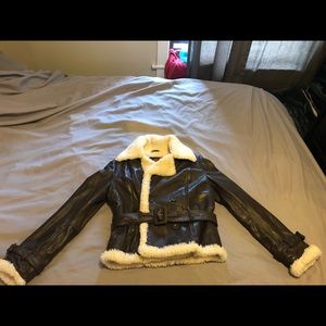 Woman’s leather and fleece bomber coat